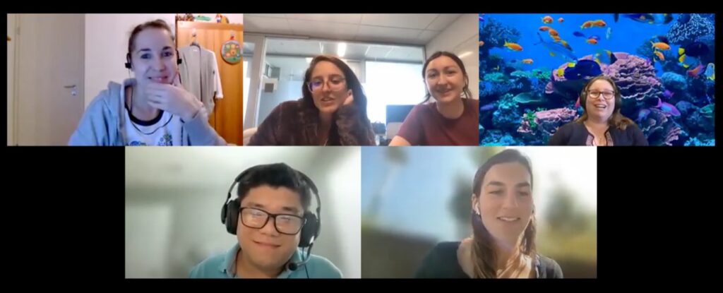 Screenshot of a SpEED group zoom call with five windows featuring six smiling people who appear mid-conversation.